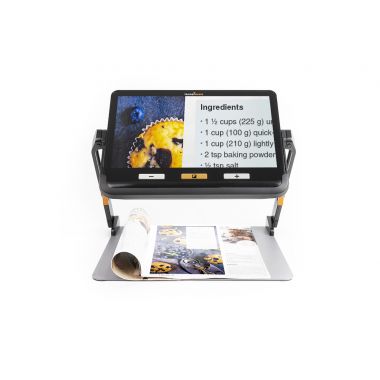 Image of the exploré 12 on its reading stand enlarging a blueberry muffin recipe. 